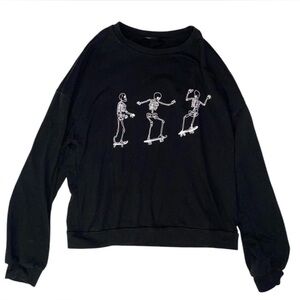 black long sleeve skeleton on skateboard tee